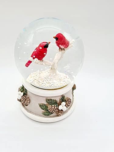 Cardinal Snow Globe jucându -vă Crăciunul fericit